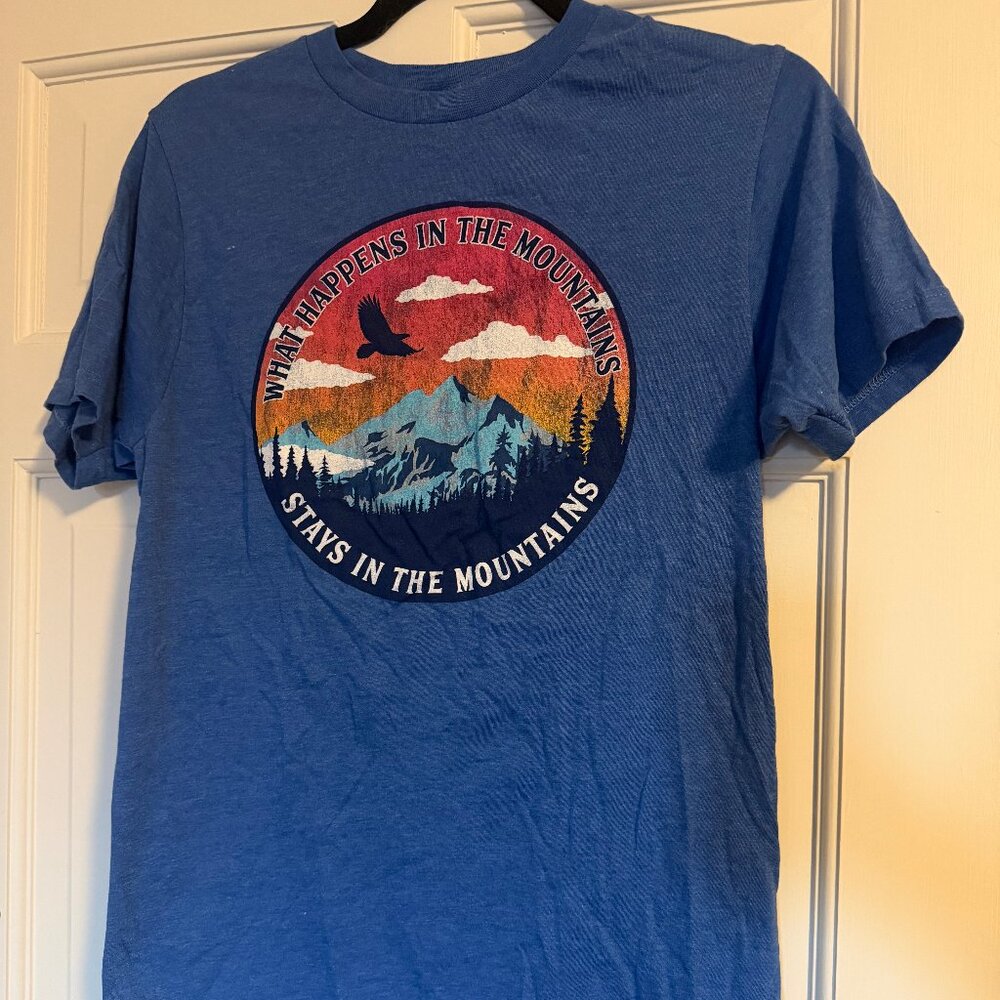 "What Happens in the Mountains" T-shirt